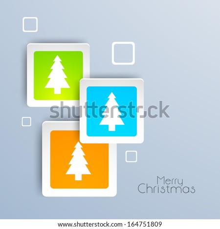 Creative Merry Christmas celebration sticker, tag or label decorated with Xmas trees on grey background.