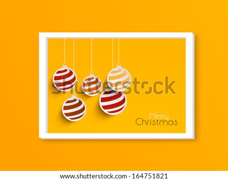 Creative Merry Christmas celebration greeting card or invitation card with hanging decorated Xmas balls in frame on yellow background.