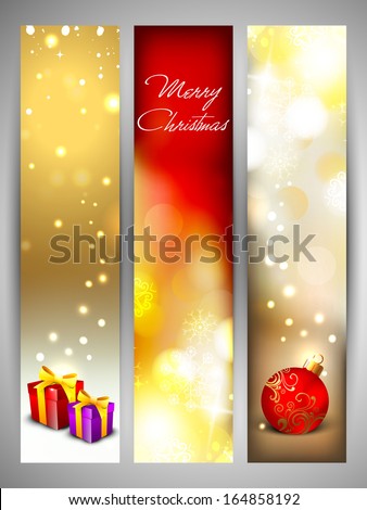 Merry Christmas celebration website banner set decorated with shiny snow flakes, Christmas ball and gift boxes.