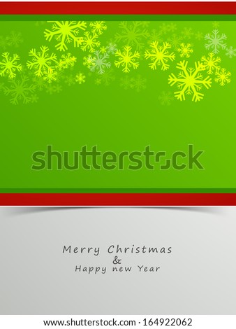 Merry Christmas and Happy New Year 2014 celebration greeting card or invitation card with shiny snowflakes on green and grey background.