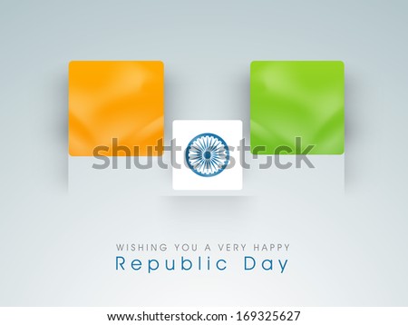 Happy Indian Republic Day concept with national flag colors board with Asoka wheel on grey background.