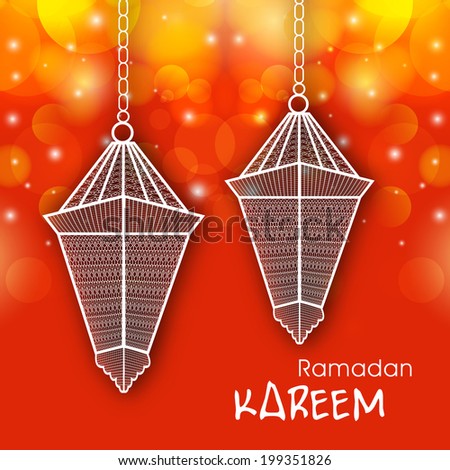 Hanging arabic lantern on bright orange and yellow background for holy month of Muslim community Ramadan Kareem.