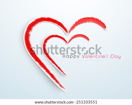 Creative hearts with red splash for Happy Valentine\'s Day celebration on shiny sky blue background.