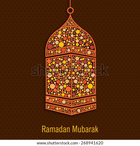 Hanging colourful lantern on brown background for Islamic holy month of prayers, Ramadan Kareem celebration.