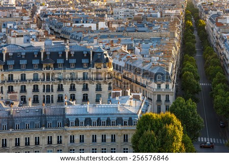 Aerial view of Paris 16th arrondissement with its haussmannian buildings, Paris rooftops and tree-lined Avenue Victor Hugo. Paris architecture and cityscape, France