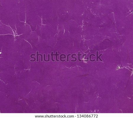 Broken, dirty and wrinkled grunge purple thick paper texture very useful as background. This texture originates in a used notebook cover.