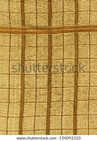 High resolution close up of a beige towel cloth with grid element.