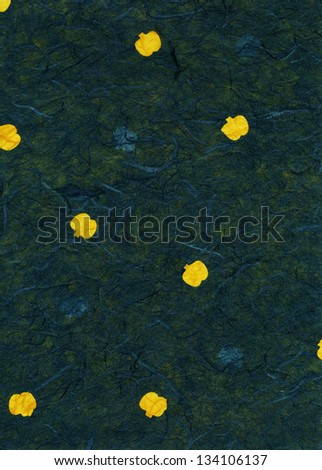 High resolution scan of green, blue and yellow rice paper with a pattern of yellow fruit, maybe apples, decorating its surface.