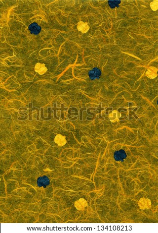 High resolution scan of  yellow rice paper with a pattern of yellow & blue fruit, maybe apples, decorating its surface.