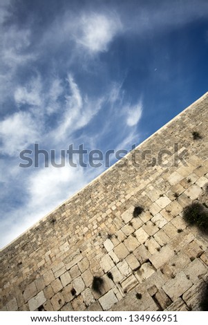 A diagonally tilted view at one of the most sacred places to the Jewish people - the Wailing Wall in the old city of Jerusalem, Israel.