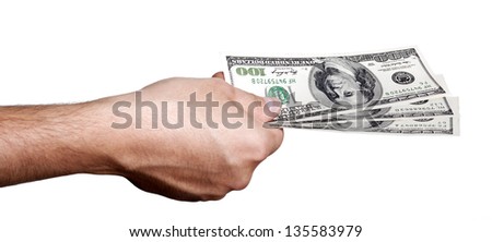 Close up of the right hand of an adult man holding three 100 US$ money notes, in the gesture of giving. Isolated on white background.