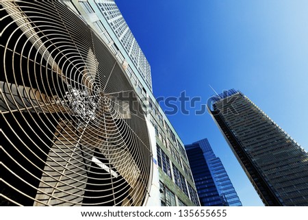 NEW YORK - CIRCA 2011: Wide angle view at an outdoor HVAC air conditioner unit located on a high-floor porch of a midtown Manhattan skyscraper. In NY, NY on Circa 2011.