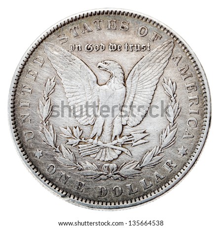 Frontal view of the obverse (heads) side of a silver dollar minted in 1883, known by the name \'Morgan Dollar\'. Depicted is an eagle with wings outstretched Isolated on white background.