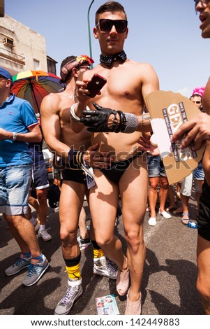 TEL-AVIV - JUN 7: People partying at the annual gay parade in the streets of Tel-Aviv, Israel on June 7 2013.