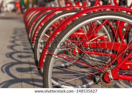red bicycles parked in the city