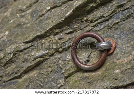 Metal ring in the rock for works on height