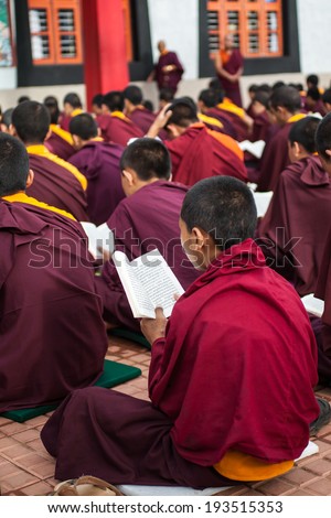 Kushalnagar, India - JUNE 25th 2009 - Buddhist Monks reading scripture in the monastery in Kushalnagar, India June 25th 2009.