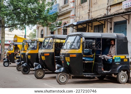MYSORE, INDIAÂ  JULY 24th Â A row of auto rickshaws waiting for passengers in Mysore, South India on 24th July 2010.