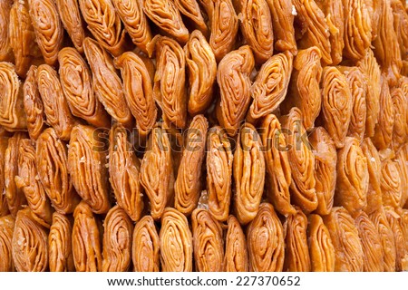 Khaja Ã¢Â?Â? traditional Indian confectionery cooked from wheat flour and sugar, found in the eastern state of Orissa.
