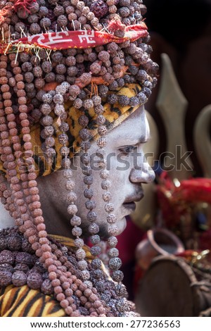 KEDARNATH, INDIA - JUNE 1 - 2013 - A naga sadhu at the shrine of Kedarnath in North India.