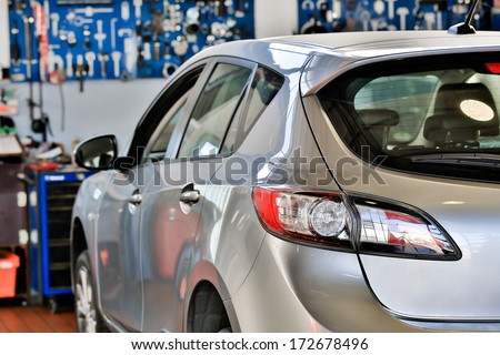 Car in a auto repair garage