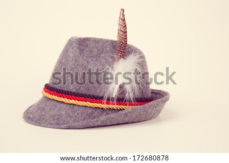 old-fashioned bavarian man\'s hat on white