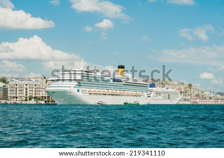 ISTANBUL, TURKEY - September 20: Cruise ship is moored near the Galata Tower. COSTA PASIFICA Cruise in the Bosphorus. September 20, 2014 in ISTANBUL, TURKEY
