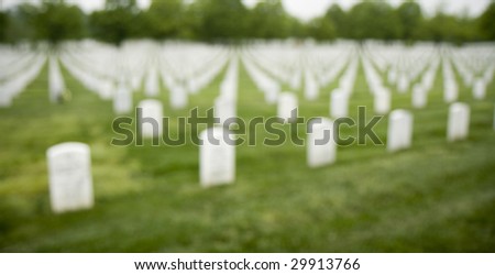 Rows of head stones at Arlington cemetery  intentionally blurred