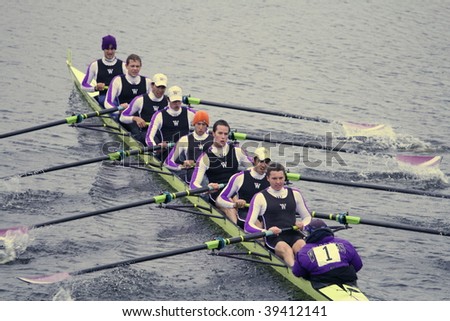 BOSTON - OCTOBER 18: Williams College Boat Club women\'s rowing team competes in the Head Of The Charles Regatta on October 18, 2009 in Boston, Massachusetts.