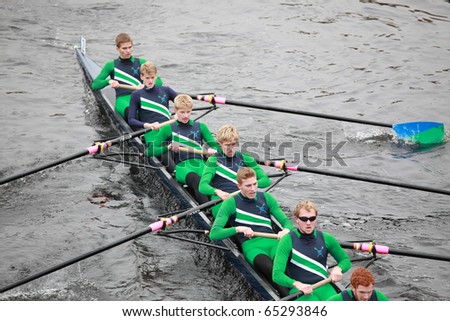 BOSTON - OCTOBER 24: New Trier High School Rowing Men 18 and Under men\'s Crew competes in the Head of the Charles Regatta on October 24, 2010 in Boston, Massachusetts.