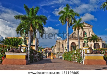 Trinidad is a town in Cuba. 500-year-old city with Spanish colonial architecture is UNESCO World Heritage site. Trinidad is famous for cobblestone streets, pastel houses with wrought-iron grills.