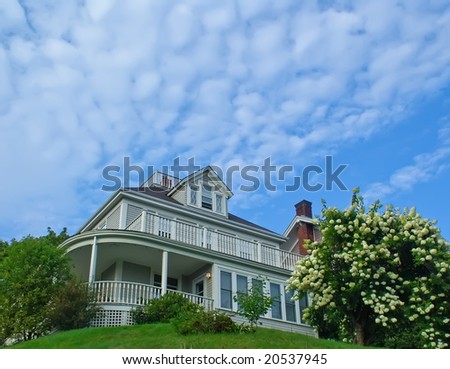 Real Estate: Detached House on the hill in blooming garden.