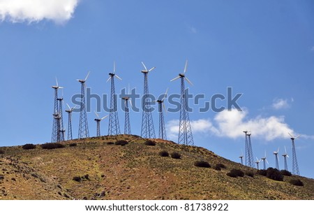 Windmill farm: Power Generating Windmills on hill. Alternative energy source. California, USA