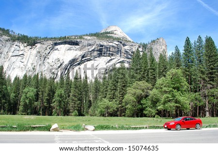Photo of California mountains landscape with red sport car