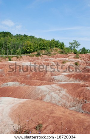 Ontario, Canada - September 14, 2008: Exotic Landscape of  the Cheltenham badlands surrounded by a forest. It is the popular hiking and biking place in Ontario, Canada