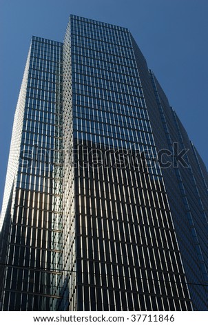 Photo of modern skyscraper reaching the sky, downtown Toronto, Canada