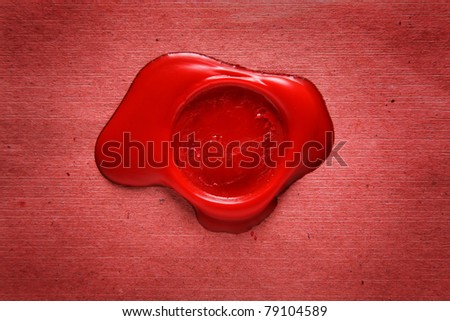 Image of red wax stamp over grunge background