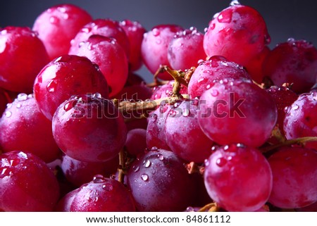 Image of red grape with water drops