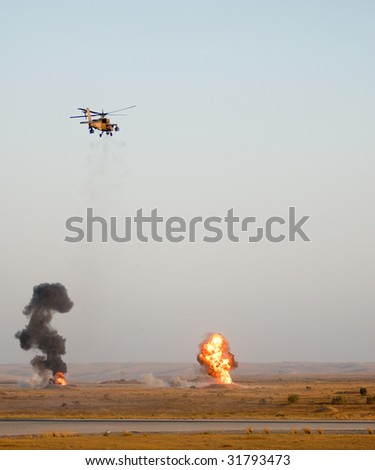 Apache helicopter shooting at targets