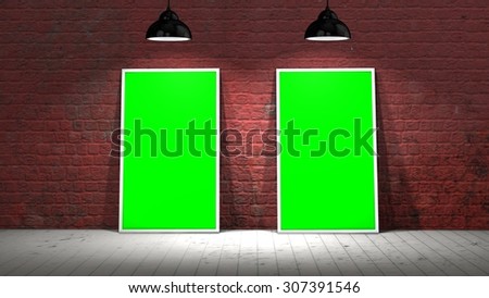 two green screen frames on old brick wall and wooden floor illuminated with spotlights