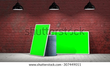 two green screen  frames and a barrel in front of a brick wall illuminated with a spotlight