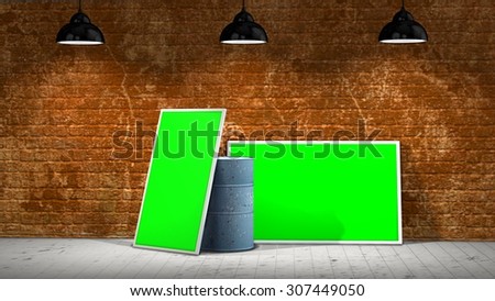two green screen  frames and a barrel in front of a brick wall illuminated with a spotlight