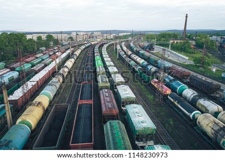 Railway Station with lots of Lines and Freight Trains. Aerial View. Location Kandalaksha Russia