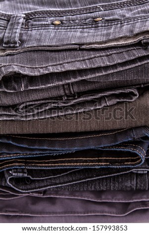 A pile of dark jeans