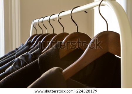 Winter clothes hanged on a clothes rack