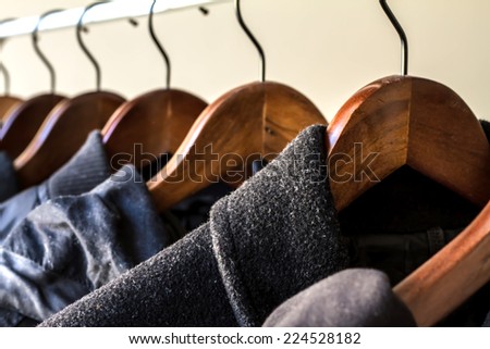 Winter clothes hanged on a clothes rack