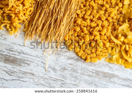 Variety of egg pasta background