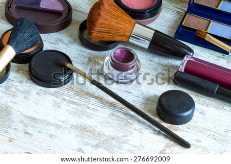Putting on make up before going out