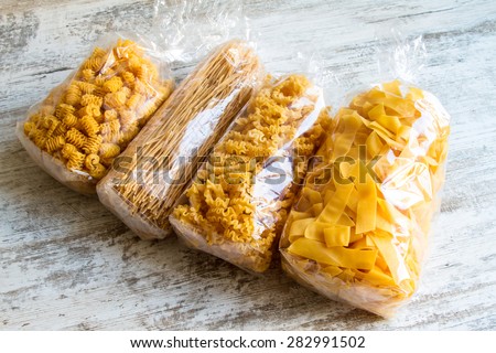 Packs of variety of egg pasta background