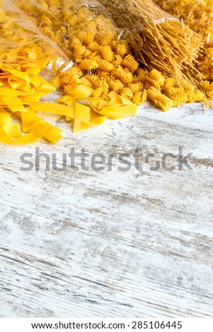 Packs of variety of egg pasta background